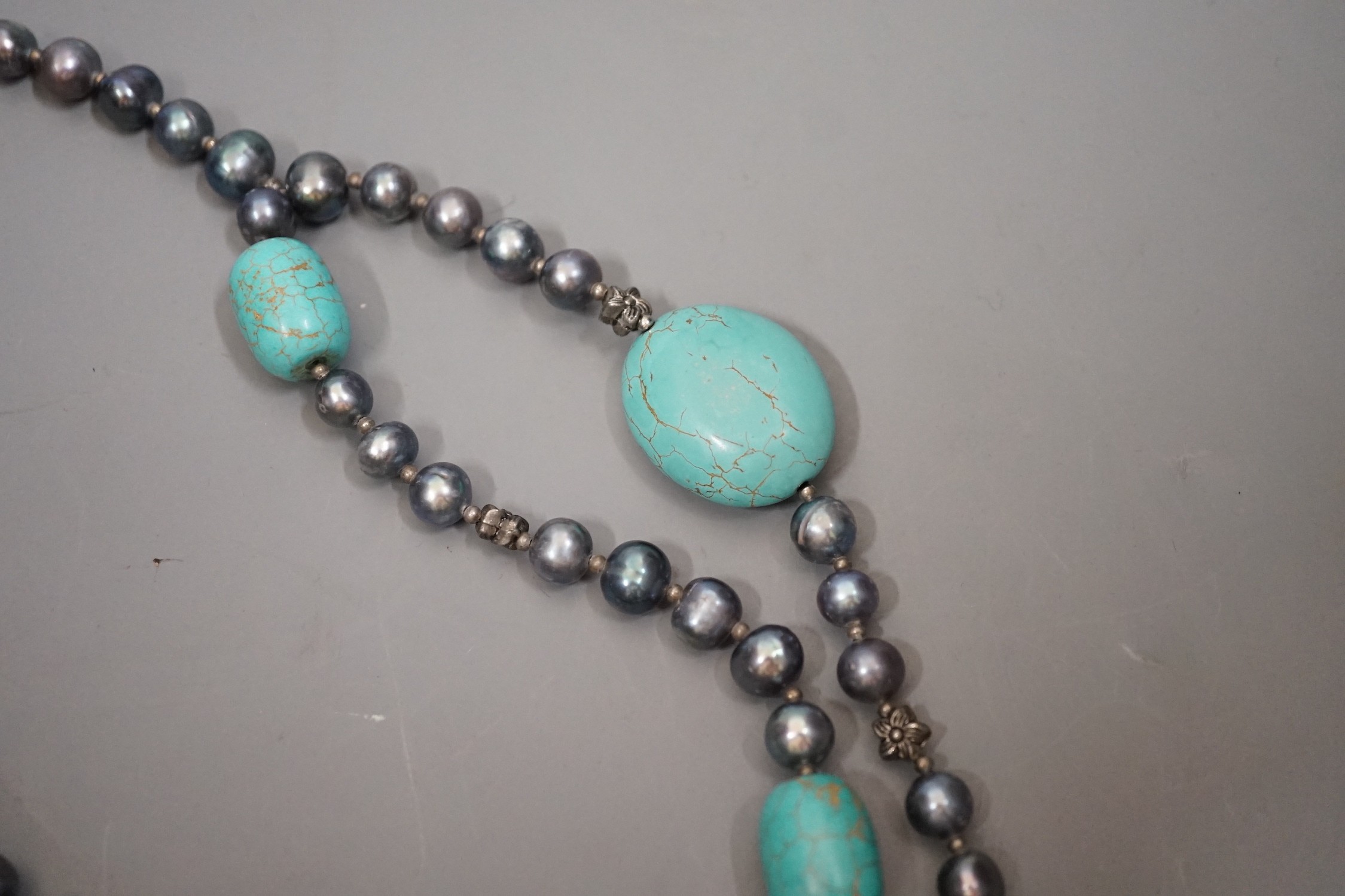 A single/double strand Tahitian? cultured pearl and turquoise necklace, 54cm.